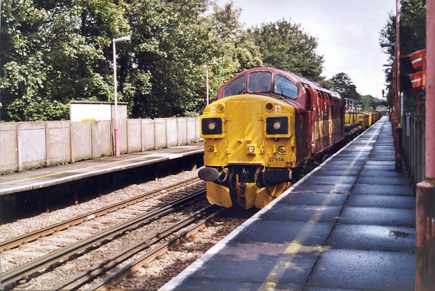 No. 37114 with an infrastructure train