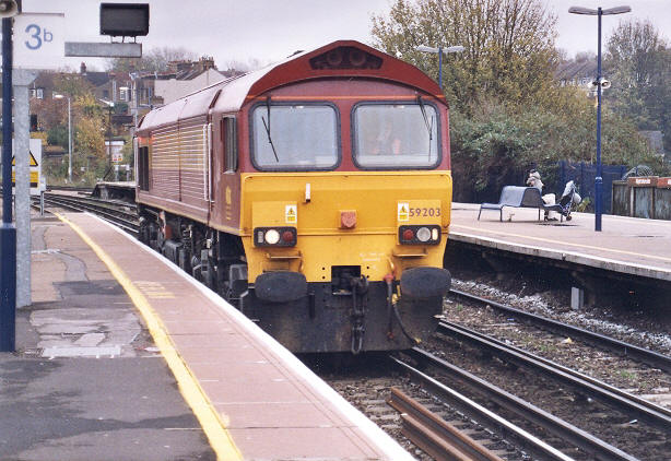 No. 59203 trundling light engine through Dartford