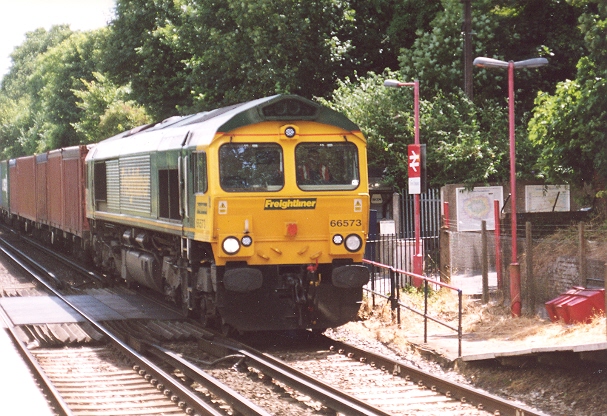 No. 66573 has originated from Thamesport. It is seen passing Stone Crossing